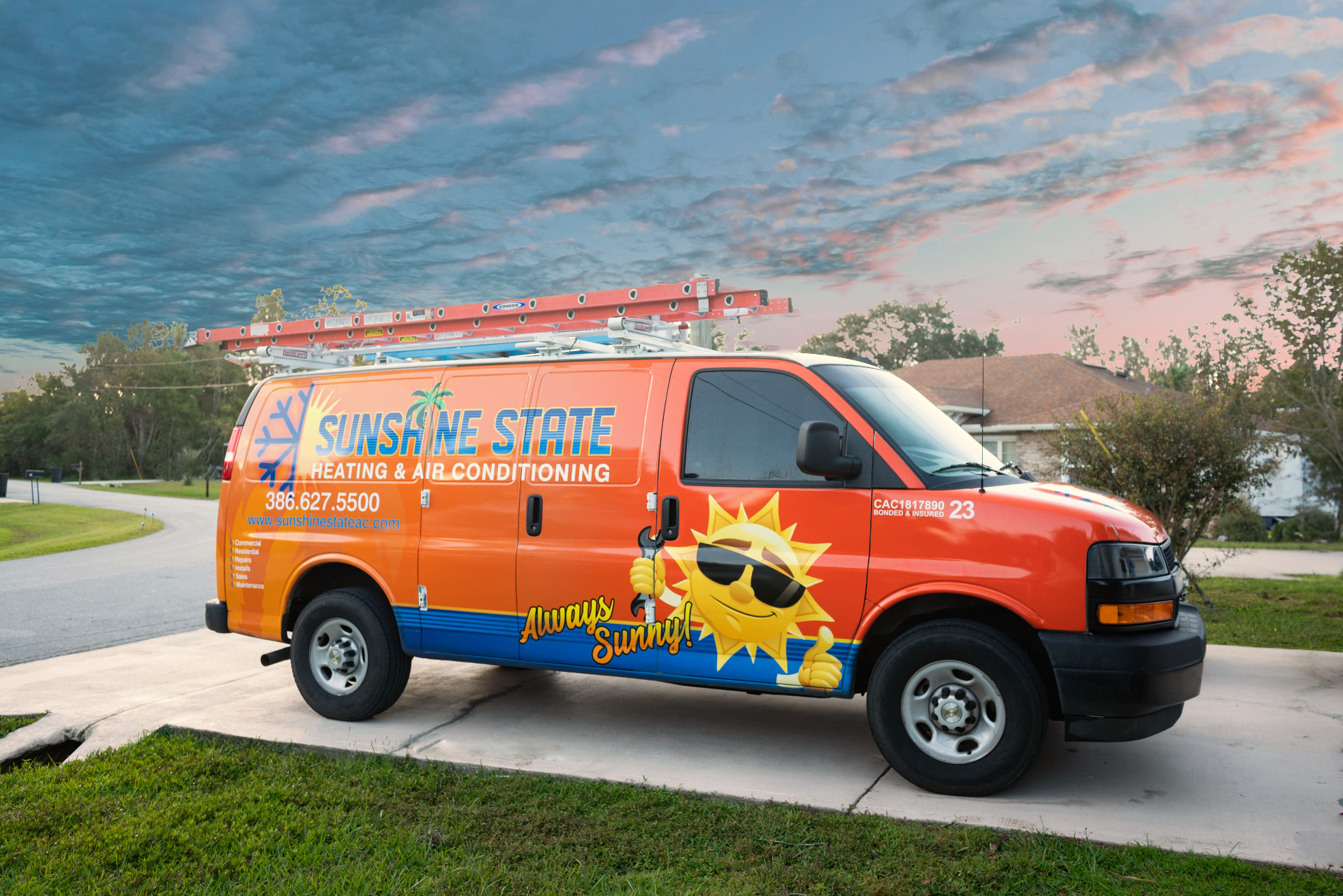 Sunshine State Heating & Air branded service van parked in a Palm Coast driveway at sunset